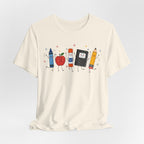 Cute School Supplies T-Shirt — Happy Pencil, Crayon, Eraser & Apple Graphic